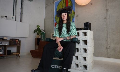 Leah Hayden Cassidy sitting in her barbershop chair