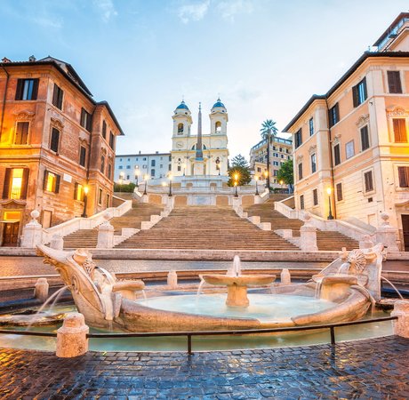 View of the Spanish Steps in Rome at dusk.