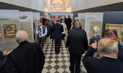 People walking around an art exhibition