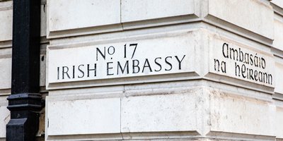 Outside the Irish embassy building in London, where 'No. 17 Irish Embassy' is carved into the stone.