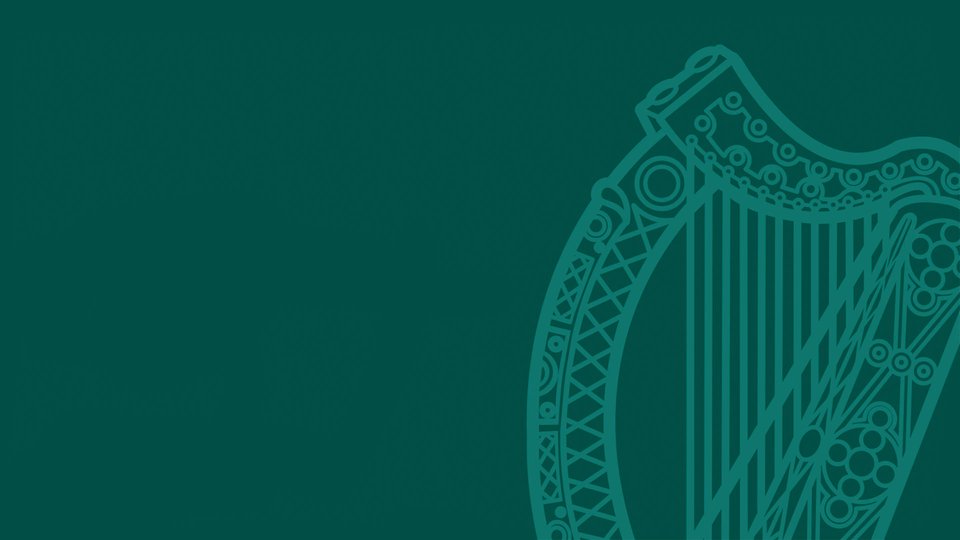 Harp illustration on green background.