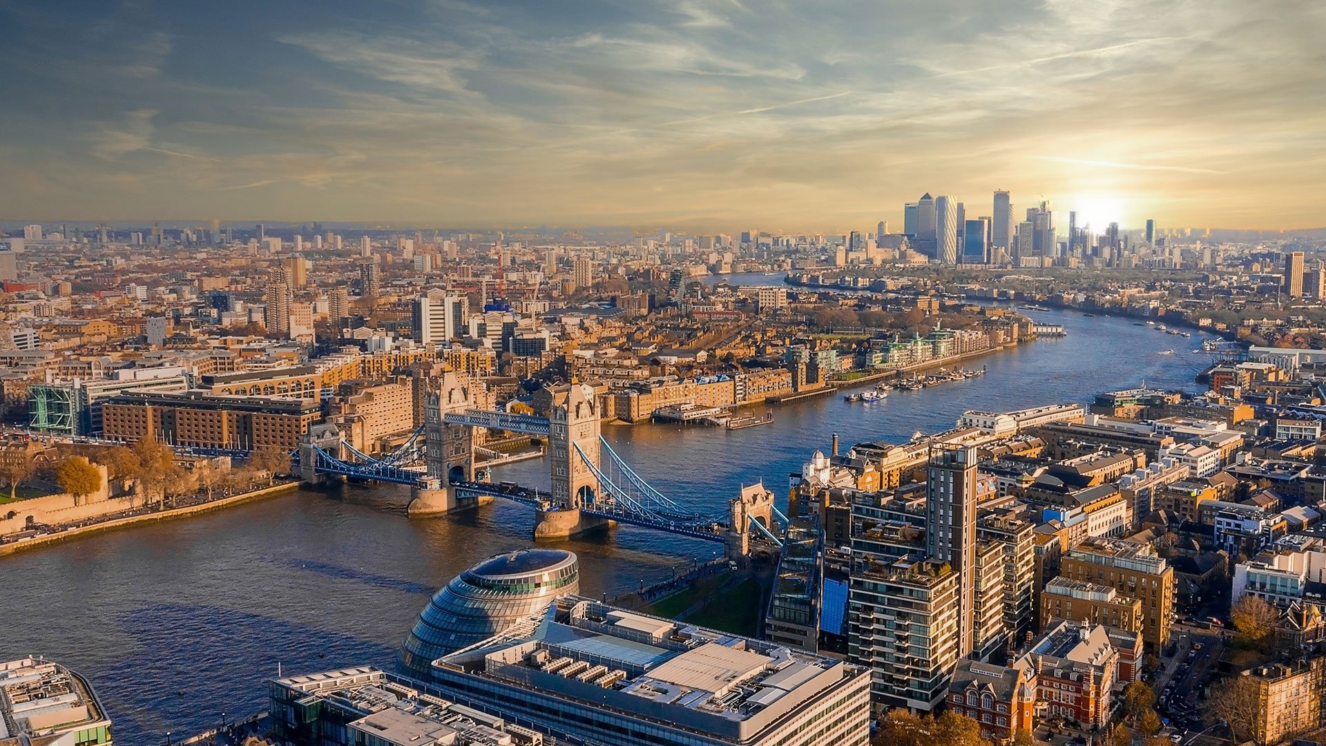 View of London city down the Thames at sunrise.