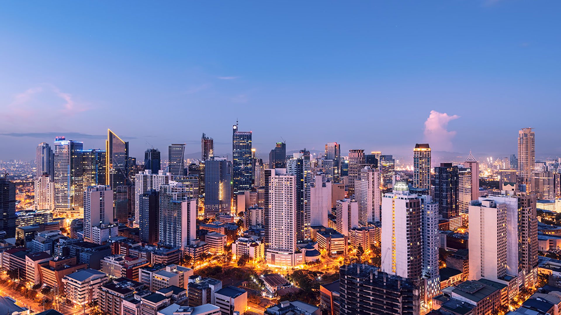 An image of Manilan skyline at nighttime