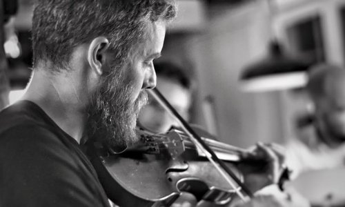 Man playing the fiddle