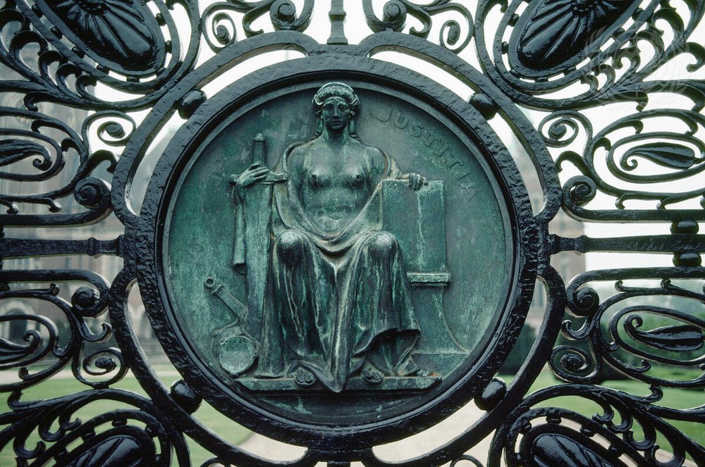 Symbol of peace in the wrought iron gates of the Peace Palace