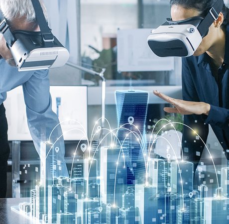 A man and a woman using virtual reality headsets in a lab.