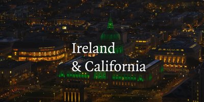 Graphic reading Ireland and California over a building in San Francisco lit up in green