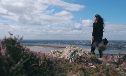 Nidhi Zak Aria Eipe looking out to sea