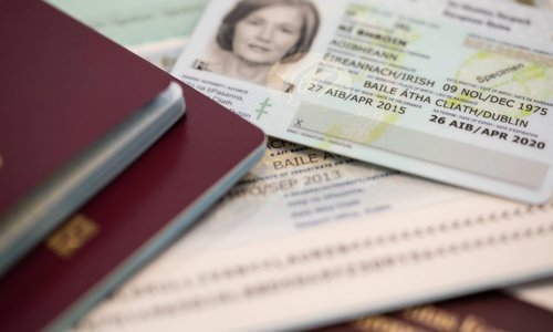 Passports and a passport card laid out