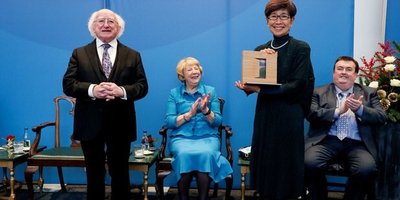 crowds marching in St Patrick's Day parade in Tokyo