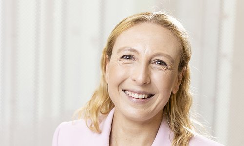 woman's face smiling at camera