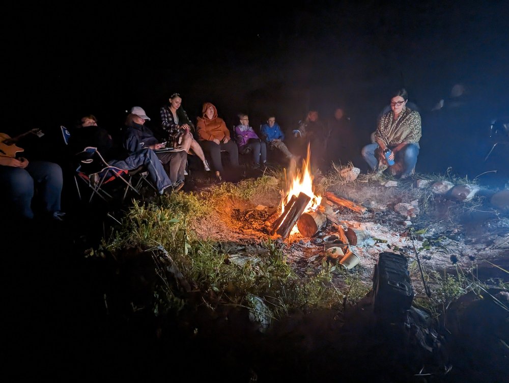 A group gathered around a campfire