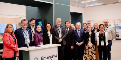 Group of people standing infront of the Irish pavilion with Enterprise Ireland at Sea Week 2024