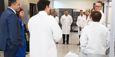People wearing labcoats in a biotechnology centre