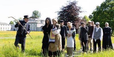 Walkers dressed in Famine-era costume in Strokestown Co Roscommon
