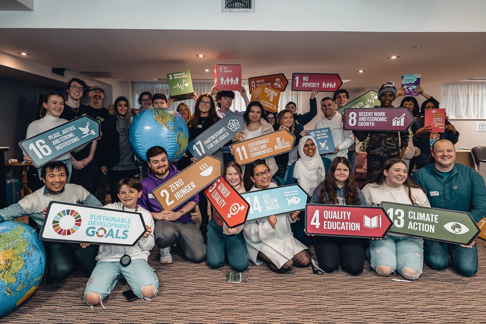 Young people at one world week event