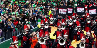 marching band in red uniforms