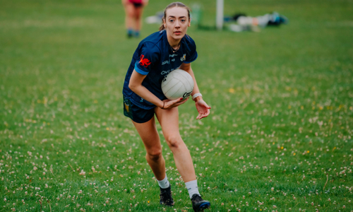 Woman playing Gaelic football