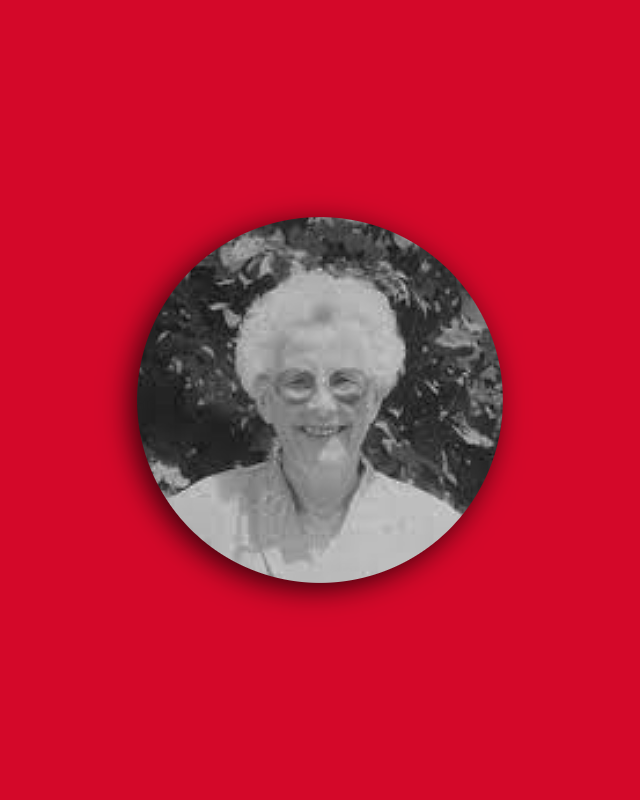 Black and white image of Lucy O'Brien smiling at the camera